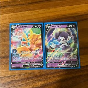 Pokemon Trading Cards - Alakazam V and Indeedee V - Blue and Purple